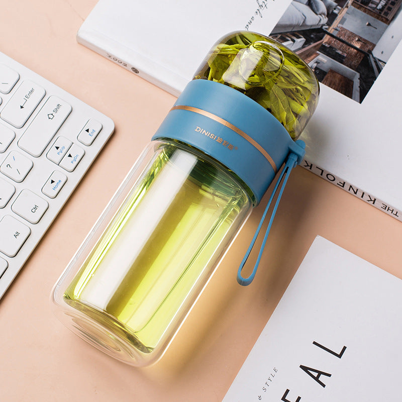 Glazen waterfles met thee infuser